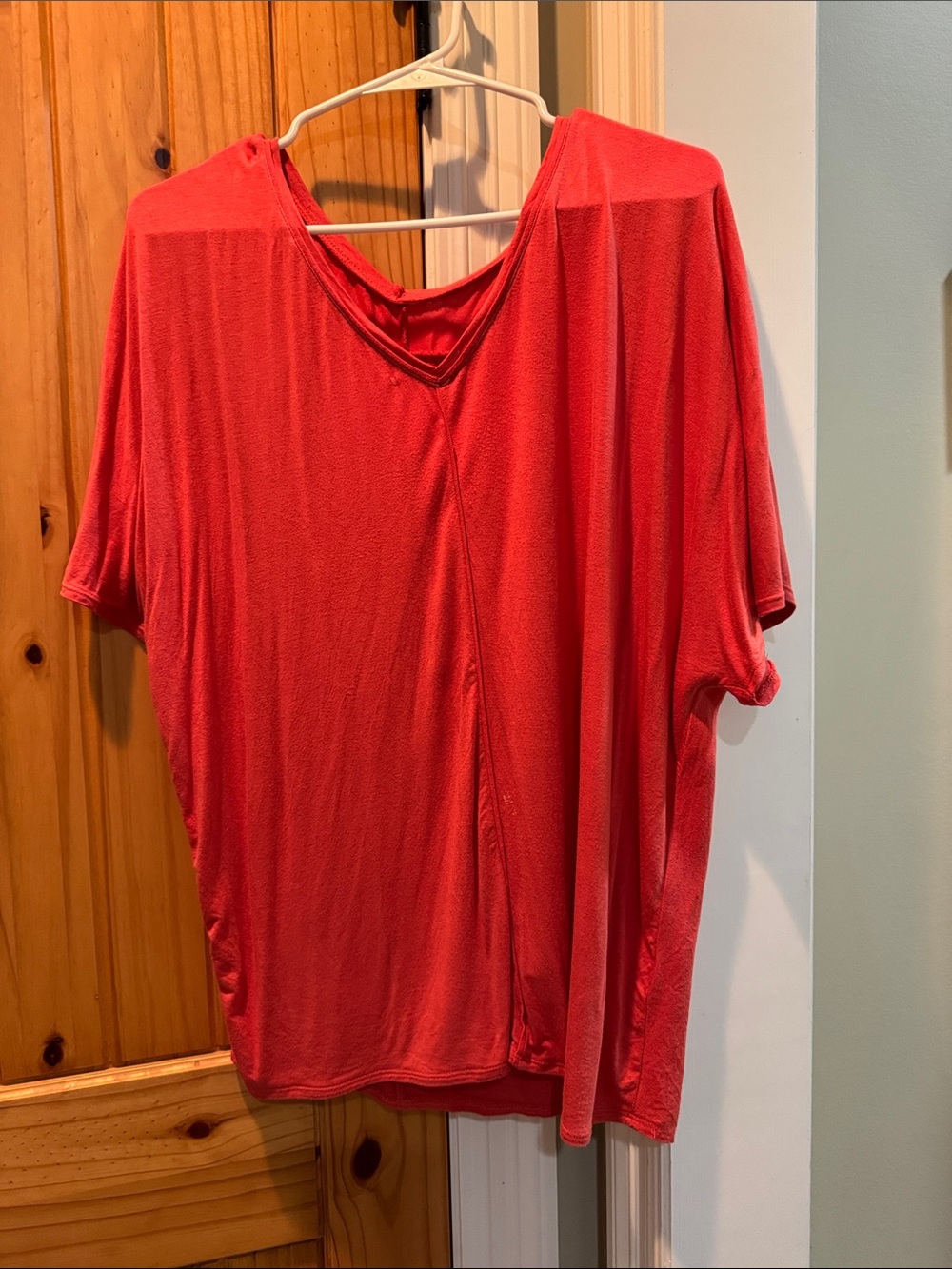 Women's Relaxed V-Neck Top in Coral Orange